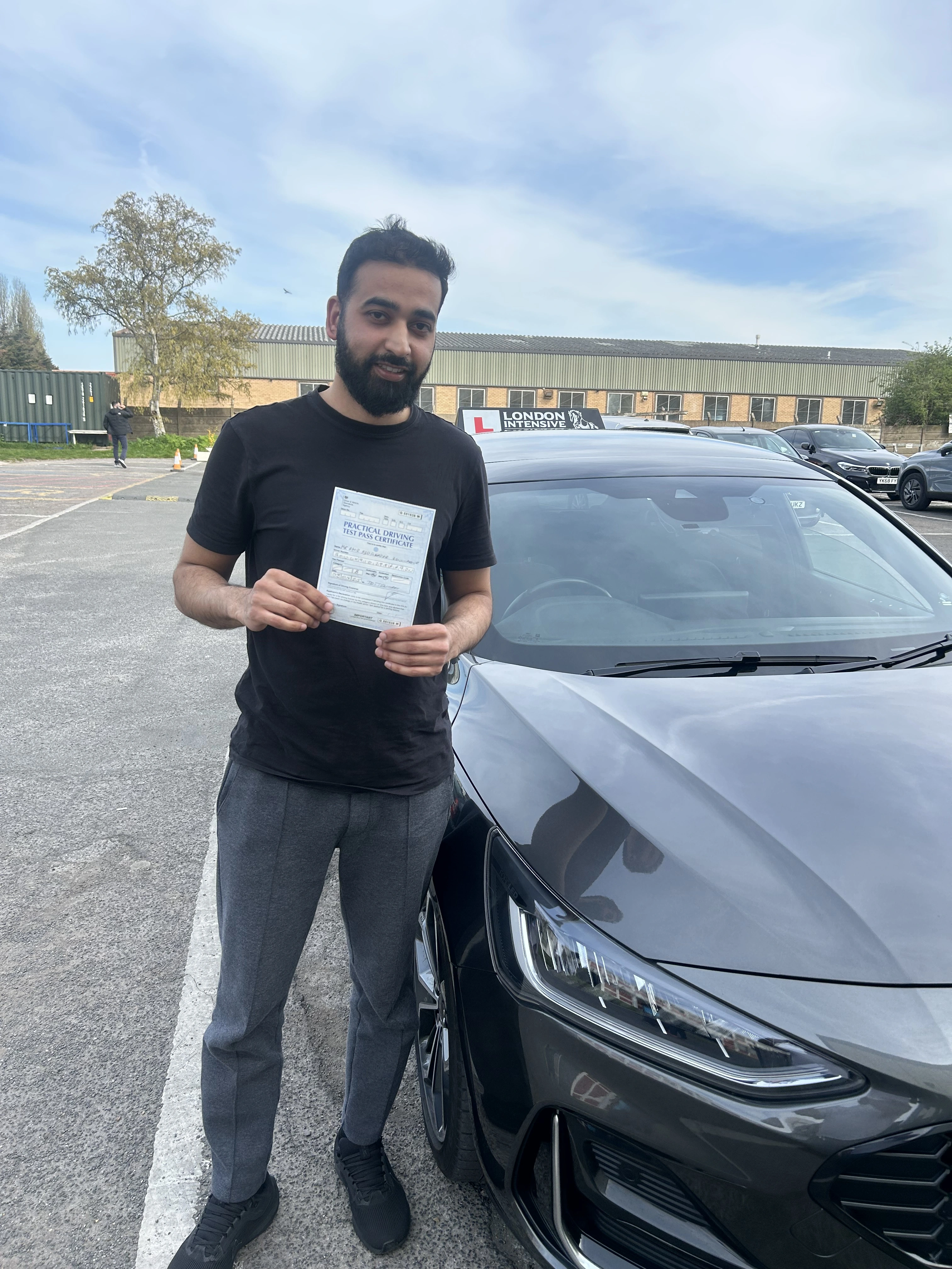 student amir passes his driving test