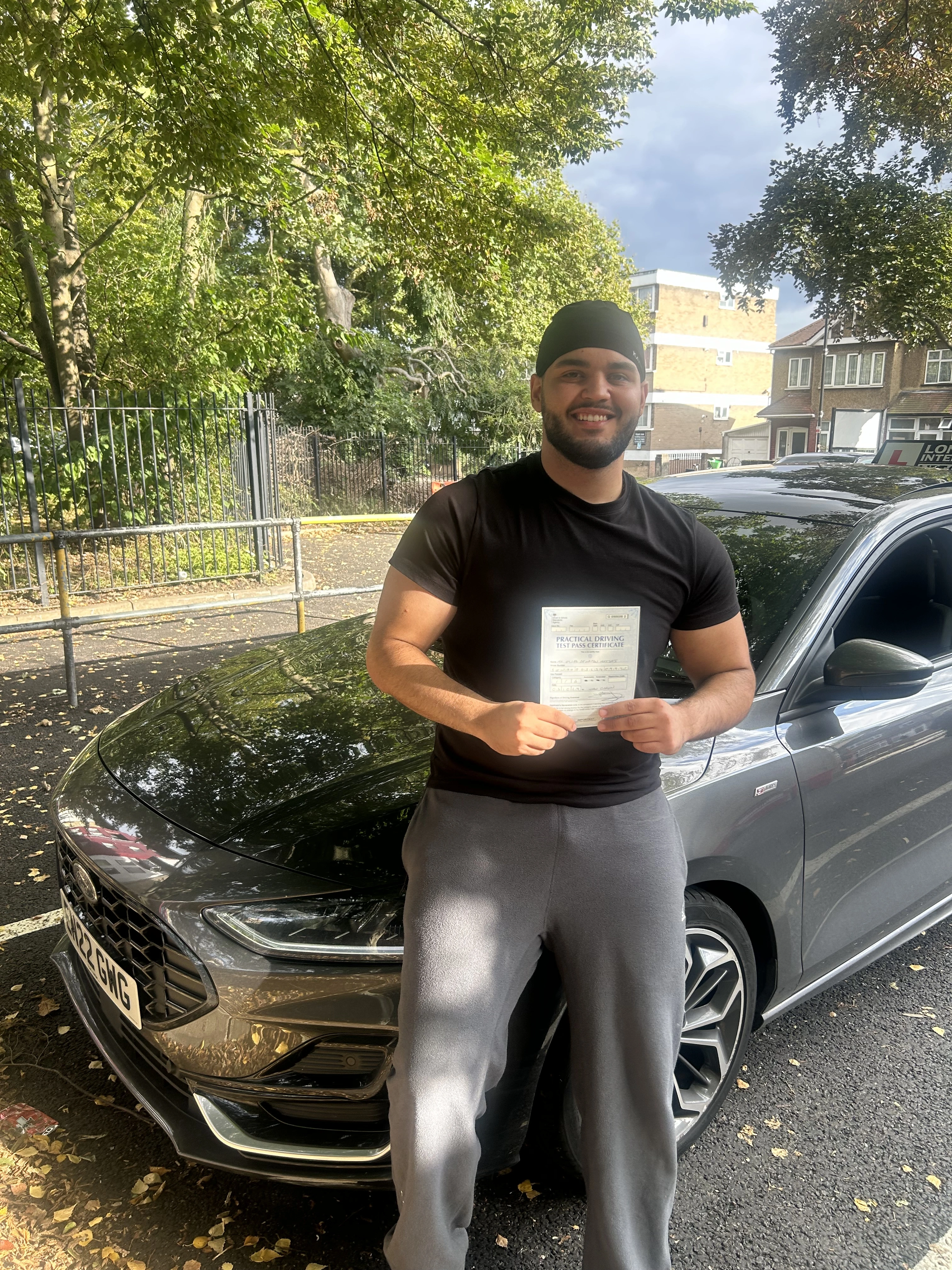 student elia passes his driving test
